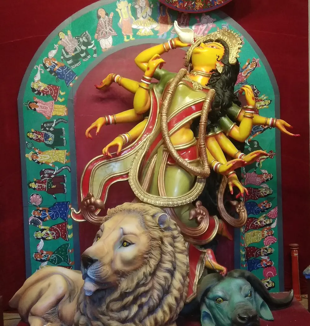 Idol of Maa Durga on her lion in a puja pandal